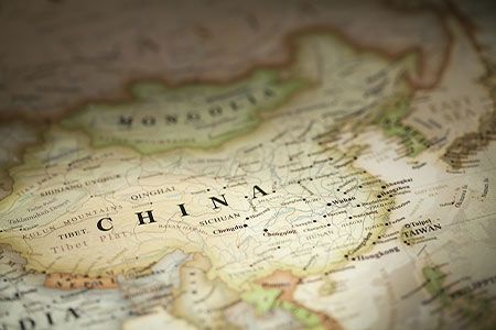 As the yuan falls, seaborne iron ore slows