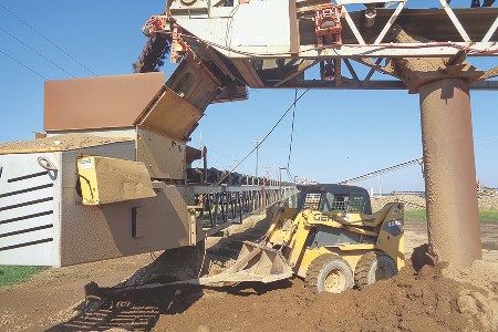 Controlling Carryback At Conveyor Transfer Points